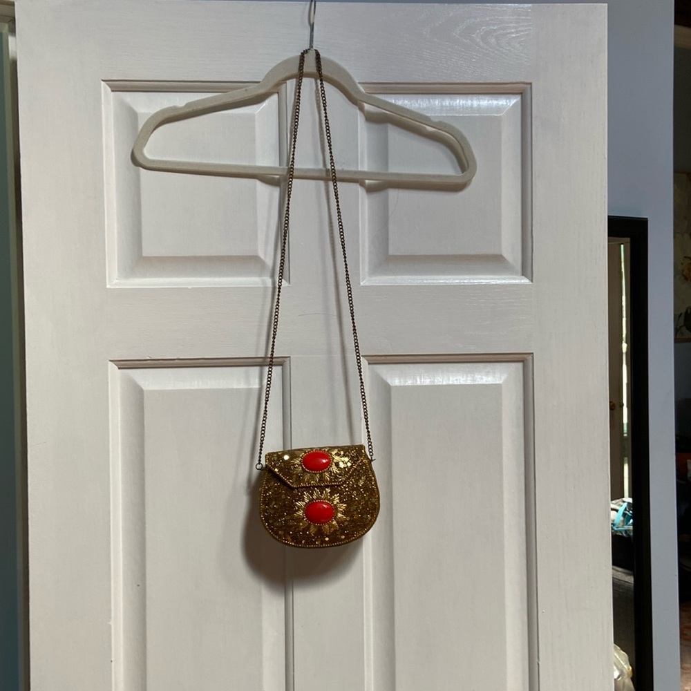 Embroidered metal purse with long chain
